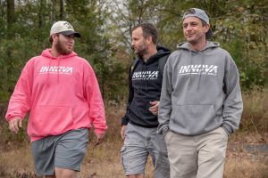 Top 10 Disc Golf Gifts: Innova Burst Disc Golf Hoodie: Pink, Black, and Gray. 